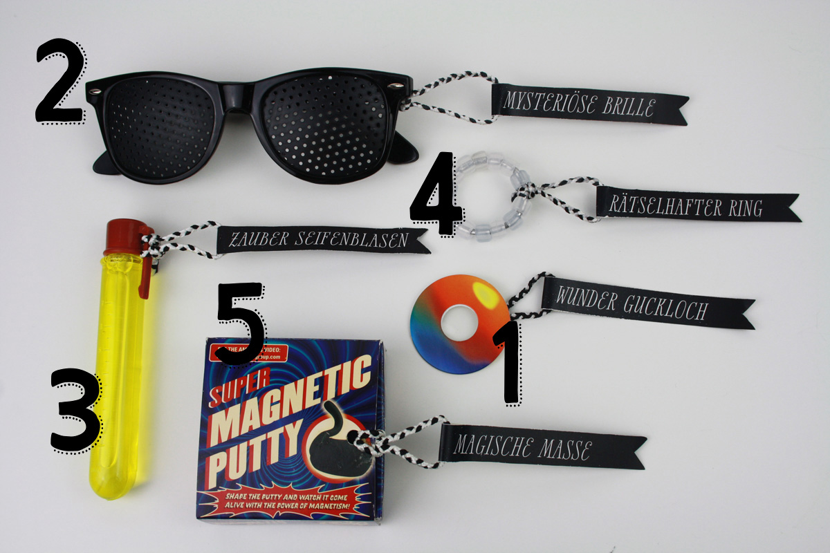 Wundertüte für einen Nerd: intelligente magnetische Knete, Lochrasterbrille, UV-Perlen, Stabile Seifenblasen, Regenbogenauge
